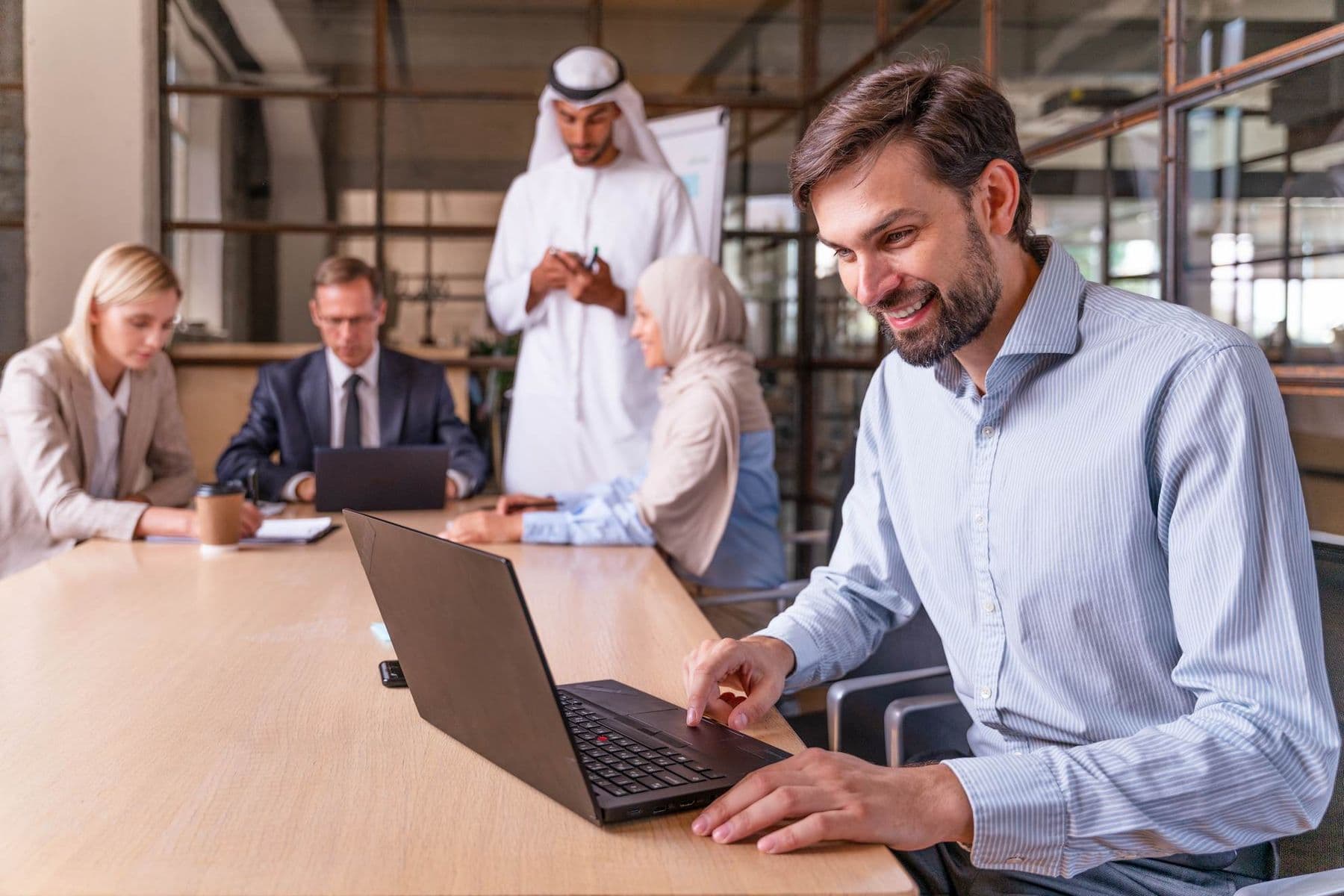 A TaxReady.ae professional preparing his clients corporate tax registration after their trade license was issued.