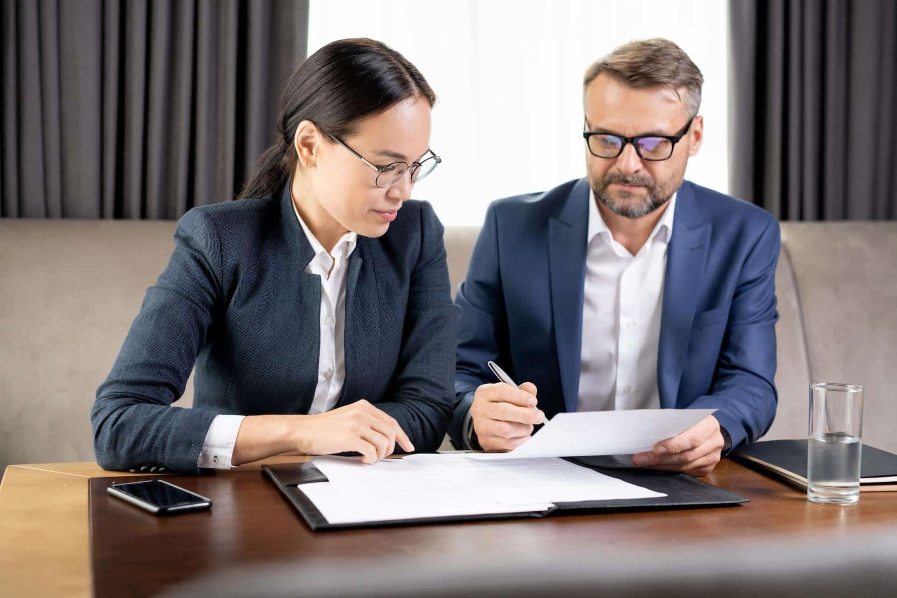 FTA reconsideration request appeal process under UAE Federal Tax Authority procedures, business professionals reviewing official tax documents.